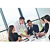 Group of happy young  business people in a meeting at office