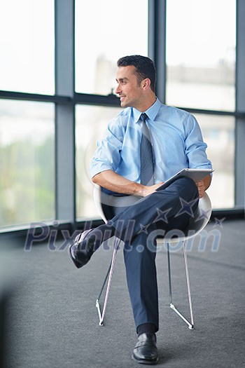 happy young business man work in modern office on computer happy young business man work in modern office on computer