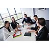 Group of happy young  business people in a meeting at office