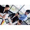Group of happy young  business people in a meeting at office