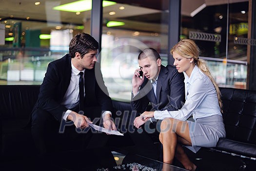 Group of happy young business people in a meeting at office Group of happy young business people in a meeting at office