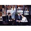 Group of happy young  business people in a meeting at office