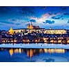 Travel Prague Europe concept background - view of Charles Bridge and Prague Castle in twilight. Prague, Czech Republic