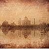 Vintage retro hipster style image of Taj Mahal with reflection in Yamuna river panorama in fog, Indian Symbol - India travel background with grunge texture overlaid. Agra, Uttar Pradesh, India