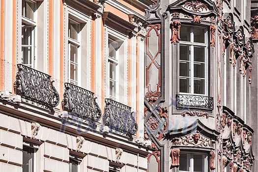 Medieval rich house palace windows close up. Munich, Bavaria, Germany Medieval rich house palace windows close up. Munich, Bavaria, Germany