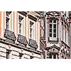 Medieval rich house palace windows close up. Munich, Bavaria, Germany