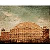 Vintage retro hipster style travel image of Famouse Rajasthan landmark - Hawa Mahal palace (Palace of the Winds), Jaipur, Rajasthan with grunge texture overlaid