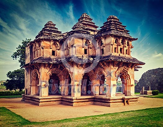 Vintage retro effect filtered hipster style travel image of Lotus Mahal palace ruins. Royal Centre. Hampi, Karnataka, India Vintage retro effect filtered hipster style travel image of Lotus Mahal palace ruins. Royal Centre. Hampi, Karnataka, India