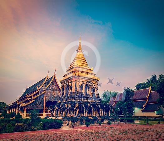 Vintage retro effect filtered hipster style travel image of Buddhist temple Wat Chedi Luang in twilight. Chiang Mai, Thailand Vintage retro effect filtered hipster style travel image of Buddhist temple Wat Chedi Luang in twilight. Chiang Mai, Thailand
