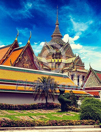 Vintage retro effect filtered hipster style travel image of Buddhist temple Wat Pho. Bangkok, Thailand Vintage retro effect filtered hipster style travel image of Buddhist temple Wat Pho. Bangkok, Thailand