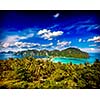 Vintage retro hipster style travel image of Travel vacation background - Tropical island with resorts - Phi-Phi island, Krabi Province, Thailand