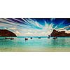 Vintage retro effect filtered hipster style travel image of long tail boat on beach on sunset on ebb. Thailand