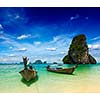Long tail boats on tropical Pranang beach, Krabi, Thailand