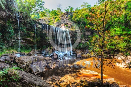 High dynamic range HDR image of tropical waterfall. Popokvil Waterfall, Bokor National Park, Cambodia High dynamic range HDR image of tropical waterfall. Popokvil Waterfall, Bokor National Park, Cambodia