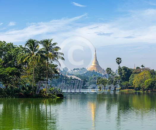 Travel Myanmar tourism background - view of Shwedagon Pagoda over Kandawgyi Lake in Yangon, Burma Myanmar Travel Myanmar tourism background - view of Shwedagon Pagoda over Kandawgyi Lake in Yangon, Burma Myanmar