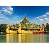 Yangon icon landmark and tourist attraction Karaweik - replica of a Burmese royal barge at Kandawgyi Lake, Yangon, Myanmar Burma