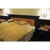 modern hotel room appartment indoor with double bed and lcd tv