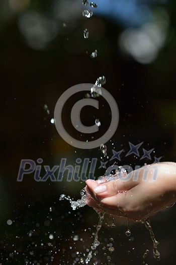 beauty and spa fresh water stream on woman hand beauty and spa fresh water stream on woman hand