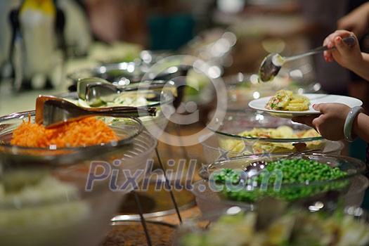 catering buffet food indoor in luxury restaurant with meat colorful fruits  and vegetables