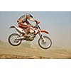 motocross bike in a race representing concept of speed and power in extreme man sport