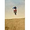 motocross bike in a race representing concept of speed and power in extreme man sport