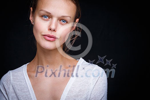 Very retty young woman's simple studio portrait, without too much retouching (color toned image; shallow DOF) Very retty young woman's simple studio portrait, without too much retouching (color toned image; shallow DOF)
