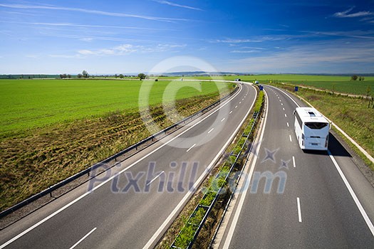 highway traffic on a lovely, sunny summer day highway traffic on a lovely, sunny summer day