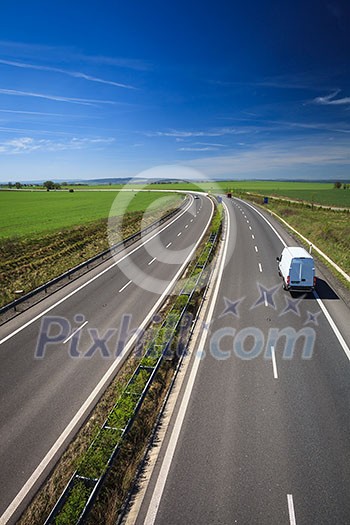 highway traffic on a lovely, sunny summer day highway traffic on a lovely, sunny summer day