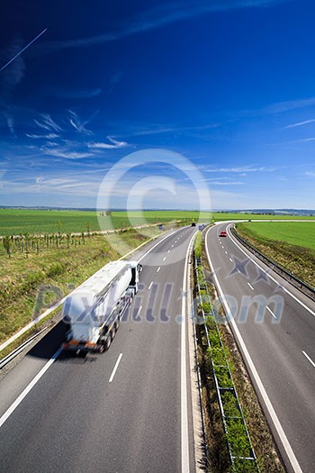 highway traffic on a lovely, sunny summer day highway traffic on a lovely, sunny summer day