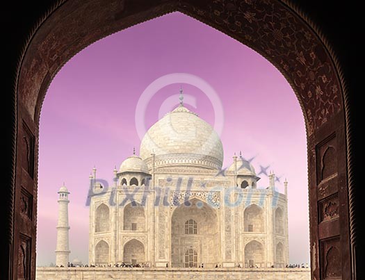Taj Mahal through arch, Indian Symbol - India travel background. Agra, Uttar Pradesh, India Taj Mahal through arch, Indian Symbol - India travel background. Agra, Uttar Pradesh, India