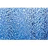 Frost patterns on window glass in winter