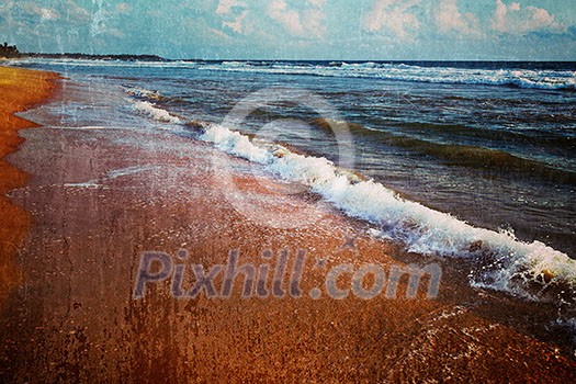 Vintage retro hipster style travel image of wave surging on sand on beach with grunge texture overlaid Vintage retro hipster style travel image of wave surging on sand on beach with grunge texture overlaid