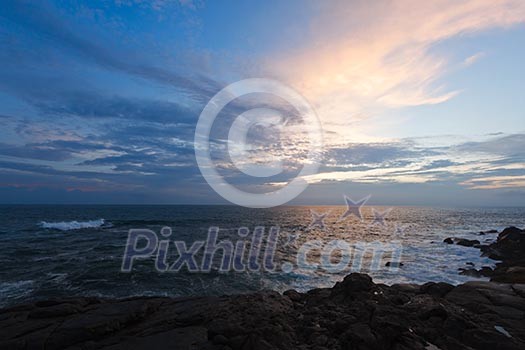 Rocky coast at sunset. Unawatuna, Sri Lanka Rocky coast at sunset. Unawatuna, Sri Lanka
