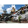 Buddhist monk statues going to Gold Buddha temple, Dambulla, Sri Lanka