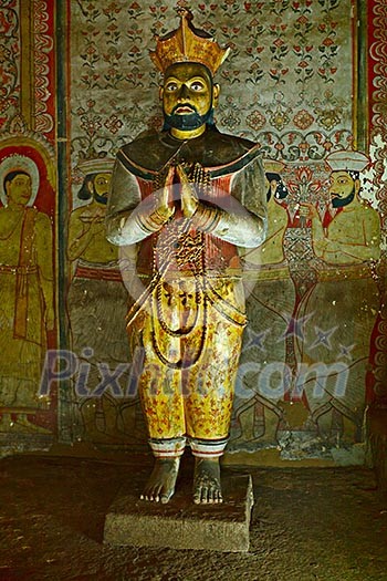 Ancient king image in Dambulla Rock Temple caves, Sri Lanka Ancient king image in Dambulla Rock Temple caves, Sri Lanka
