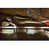 Ancient Buddha image in Dambulla Rock Temple caves, Sri Lanka