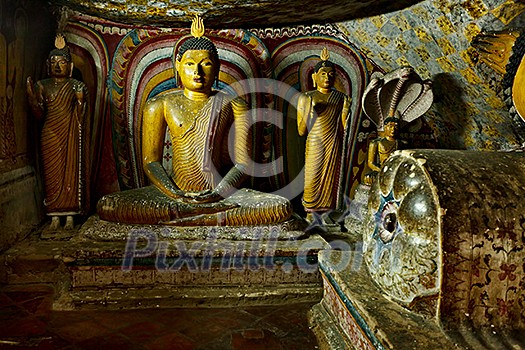 Ancient Buddha image in Dambulla Rock Temple caves, Sri Lanka Ancient Buddha image in Dambulla Rock Temple caves, Sri Lanka