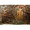 Ancient Buddha image in Dambulla Rock Temple caves, Sri Lanka