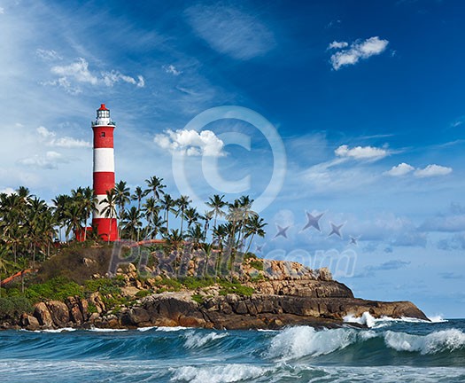 Old lighthouse and waves of sea. Kovalam (Vizhinjam) Kerala, India Old lighthouse and waves of sea. Kovalam (Vizhinjam) Kerala, India