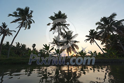 Sunset on Kerala backwaters. Kerala, India Sunset on Kerala backwaters. Kerala, India