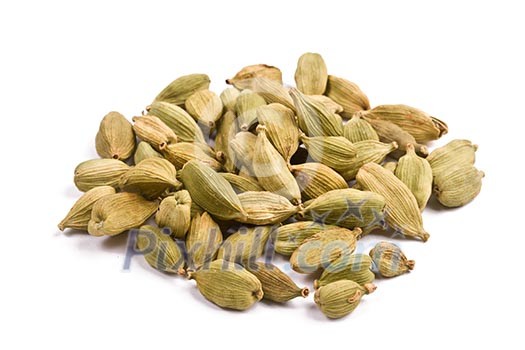 Pile of cardamom isolated on white background close up Pile of cardamom isolated on white background close up