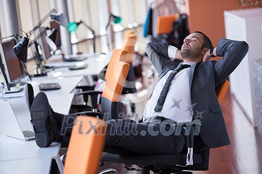 happy young business man portrait in bright modern office indoor happy young business man portrait in bright modern office indoor