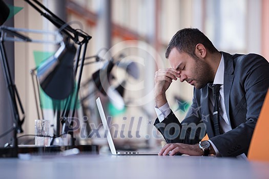 happy young business man portrait in bright modern office indoor happy young business man portrait in bright modern office indoor