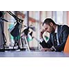 happy young business man portrait in bright modern office indoor