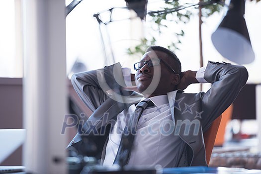 happy young business man portrait in bright modern office indoor happy young business man portrait in bright modern office indoor