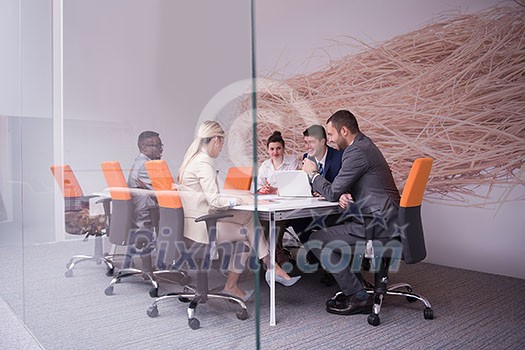 young business people group have meeting and working in modern bright office indoor young business people group have meeting and working in modern bright office indoor