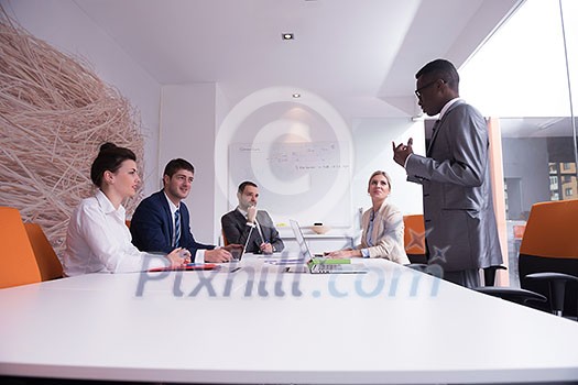 young business people group have meeting and working in modern bright office indoor young business people group have meeting and working in modern bright office indoor