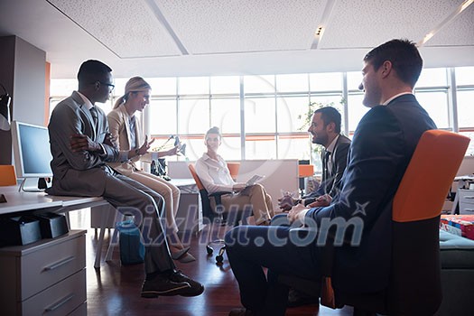 young business people group have meeting and working in modern bright office indoor young business people group have meeting and working in modern bright office indoor