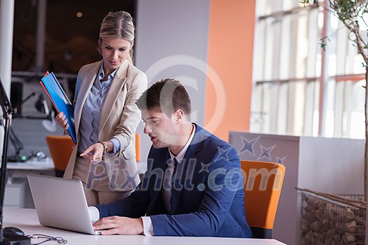 young business people group have meeting and working in modern bright office indoor young business people group have meeting and working in modern bright office indoor