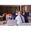 happy young business man portrait in bright modern office indoor